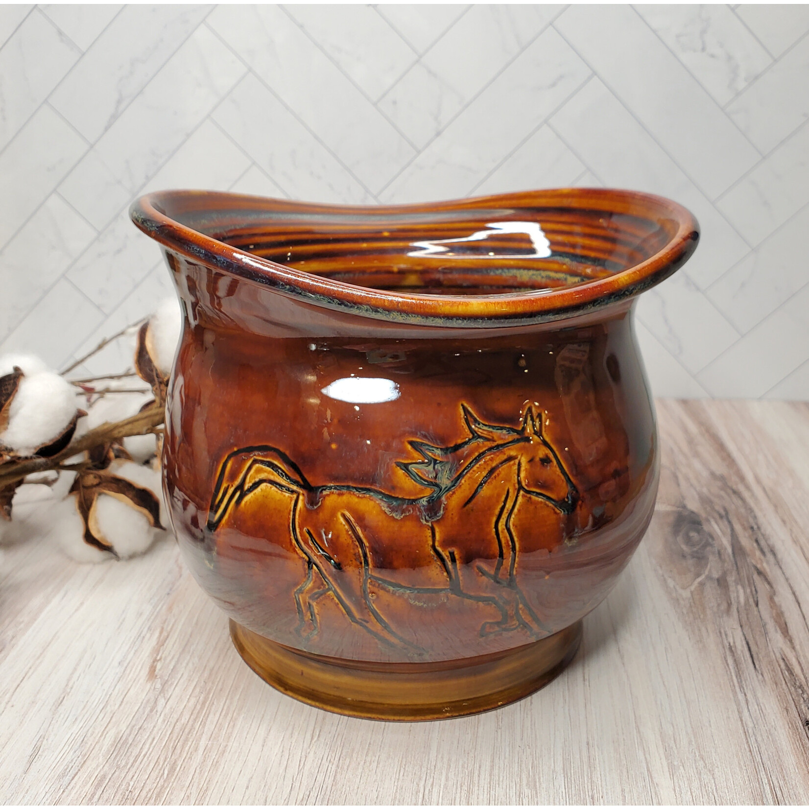 Elaine Randall "Running Free" - vessel with carved horses
